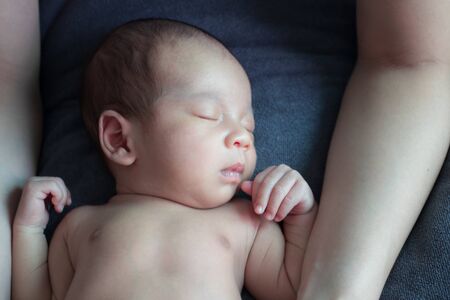Portrait of cute Asian baby, concept create newborn.の写真素材