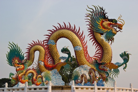 The dragon statue in the evening sky.の写真素材