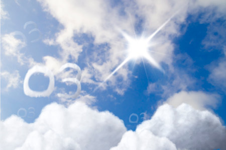 Blue sky with white clouds and sun with the word CO2.の写真素材