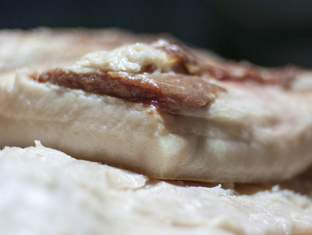 Pork fat with a piece of meat, freshly prepared, close-upの写真素材