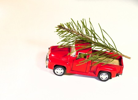 red car, on a white background, christmas treeの写真素材