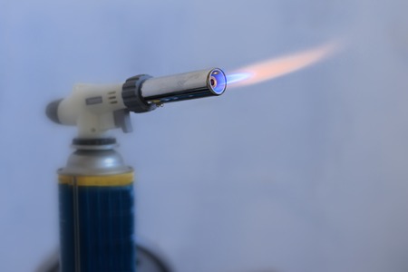 Burning gas, gas burner, burns a hundred dollars. The concept of problems with natural gas, increasing prices and gas lossesの写真素材