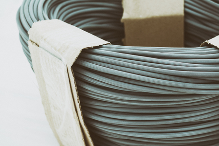 rubber seal. designed for use in windows and mosquito nets and other products. wooden white background. there is toning.の写真素材