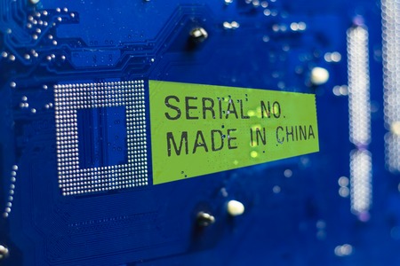 motherboard. color blue. there are scratches on it. Caption Made in China.の写真素材