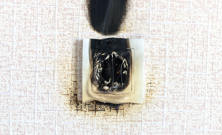 socket on fire. he is real. there is plastic melting.