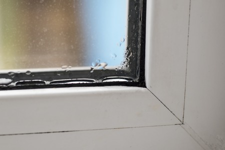 white window. there is condensation on it. close-up.
