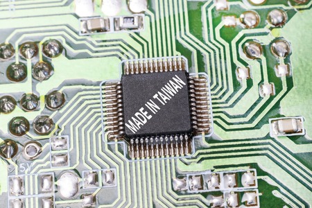 macro photography motherboard from computer. close-up. there is an inscription on it. made in...