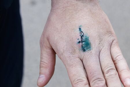 hand close up. on it is cut and sewn with thread. natural refreshmentの写真素材