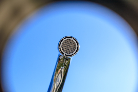 shell, colorful, bottom view. faucet aerator, close up background blue skyの写真素材
