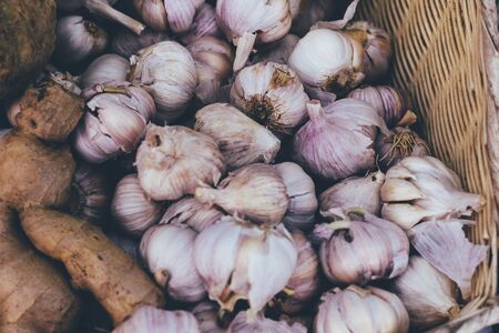 small market. sales of garlic. close-up, and shallow depth of field.