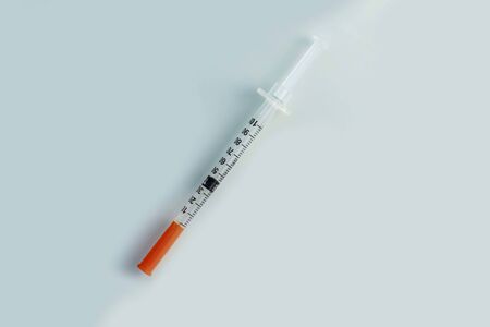 close-up. on white background. no insulation. the syringe is liquid in it. insulinの写真素材