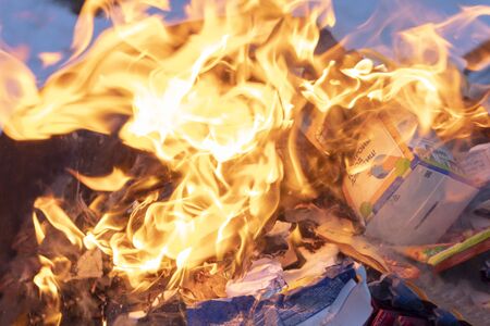 Minsk. Belarus, January 29, 2020. Burning garbage in a metal barrel. The concept of the destruction of the ozone layer.のeditorial素材