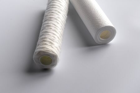 White background, no isolation. Close-up. Water filter two units.の写真素材