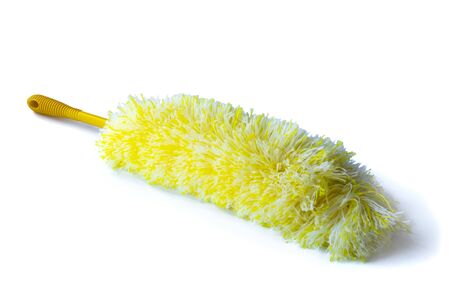 a brush for dust, a soft shadow falls from it yellow. Close-up. Isolated on a white background.の写真素材