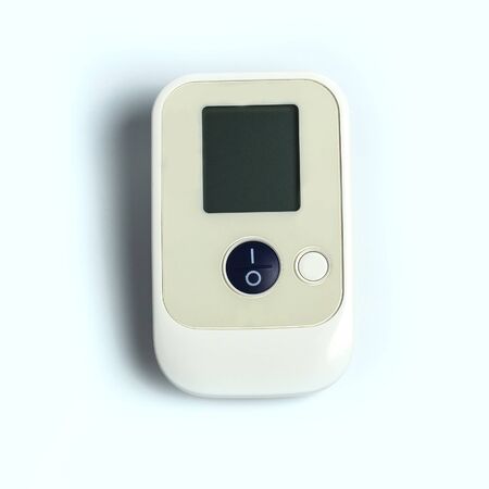 A sphygmomanometer is a device used to measure blood pressure. On white background. Close-up.