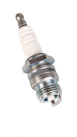 Spark plug from a car. New. Photographed against a white background. Isolate. Close-up