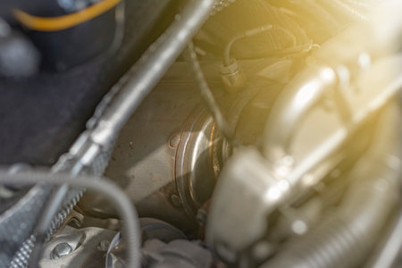 Natural light. the car. Engine compartment. Low depth of field. Silencer with a sensor for clogging...