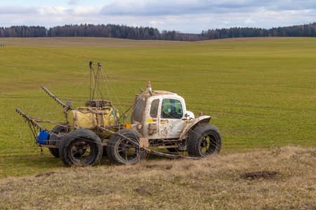 Street lighting. special machine on wheels for gentle spraying of crops in the field. Filled with...