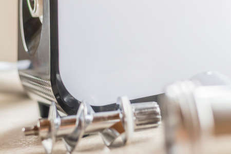 soft focus. natural light. electric meat grinder. close up.