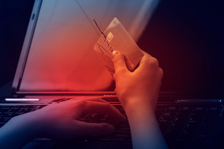 soft focus, bank card, hook. the child pays for the purchase using the card. scammers are trying to...