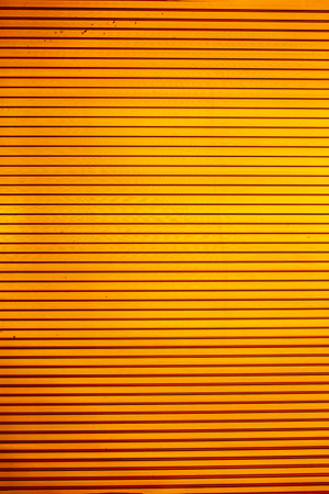 daylight. the background and texture are made of polycarbonate plastic. The transparent surface made of corrugated plastic is used for partitions or roofsの写真素材