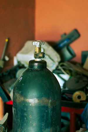 valve on the oxygen cylinder. Cylinder compressed gases for oxygen, nitrogen, carbon dioxide, hydrogen and argon for weldingの写真素材