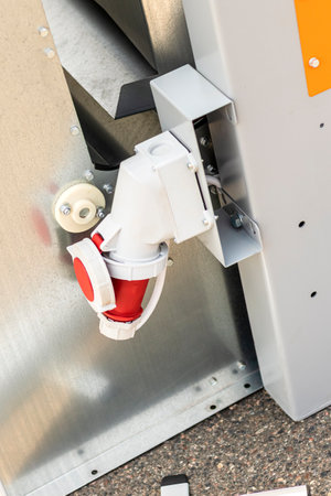 Industrial sockets and plugs on the distribution board. preparation of the construction site for...