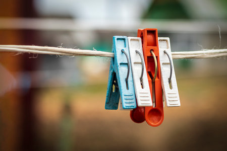 rope, clothespin. The concept of different opinions, one is not like the other.の写真素材