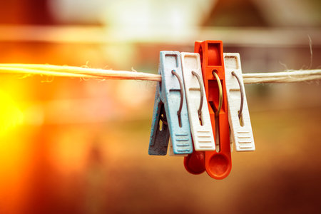 rope, clothespin. Leadership, the concept of different opinions, one is not like the other.の写真素材