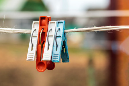 rope, clothespin. The concept of different opinions, one is not like the other.の写真素材
