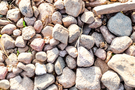 stones. texture of stones lying on the road. close-up. there is tinting.
