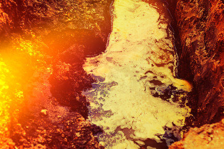 Leak from a broken water pipe in a trench near a construction site causing disruption and potential...