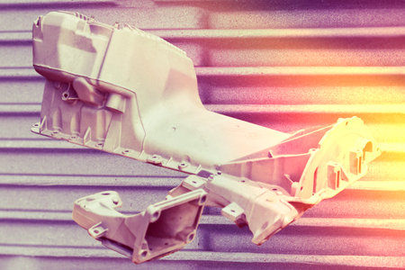 SandblaWorkers perform sandblasting on metal parts to remove surface impurities and prepare them for...