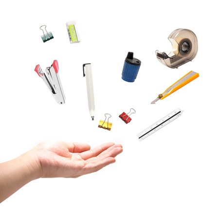 hand with office tools, isolated on white.