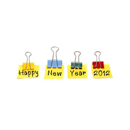 Happy new year with paper clips isolated on white background  の写真素材