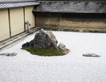 Famous zen garden of the Ryoan-ji temple in Kyoto, japanの写真素材