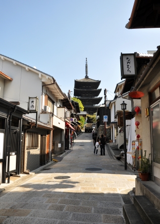 KYOTO, JAPAN - OCT 21 2012: Tourists walk on a street leading to Kiyomizu Temple on October 21 2012. Kiyomizu is a famous temple in Kyoto built in year 778.のeditorial素材