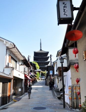 KYOTO, JAPAN - OCT 21 2012: Tourists walk on a street leading to Kiyomizu Temple on October 21 2012. Kiyomizu is a famous temple in Kyoto built in year 778.のeditorial素材