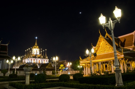 Lohaprasat in Wat Ratchanatdaram Worawihan, beautiful temple at night, Bangkok, Thailandの写真素材