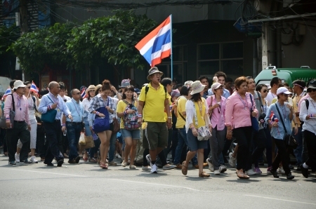 BANGKOK - DEC 9  Anti-government protesters march to Government House on December 9, 2013 in Bangkok, Thailand  The protest  attend a large anti-government in Bangkok, capital of Thailand のeditorial素材