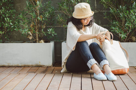 Young woman with a canvas bag, Outdoor portrait