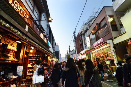 TOKYO - NOV 24   People, mostly youngsters, walk through Takeshita Dori near Harajuku train station on November 24, 2013  Takeshita Dori is considered a birthplace of Japanのeditorial素材
