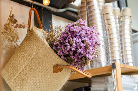 Pink flower in weave basket, Interior decorationの写真素材