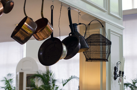 Old brass utensil in vintage kitchen の写真素材