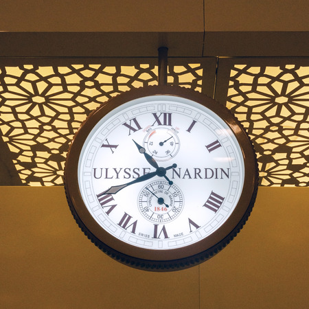 Mumbai, India - January 5, 2015: Ulysse Nardin clock in Chhatrapati Shivaji International Airport, Mumbai, India. Ulysse Nardin is a watch manufacturer founded in 1846, in Le Locle, Switzerland.のeditorial素材