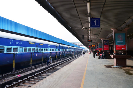 Jaipur, India - January 3, 2015: Passenger on platforms at the railway station of Jaipur, Rajasthan, India. Indian Railways carries about 7,500 million passengers annually.のeditorial素材