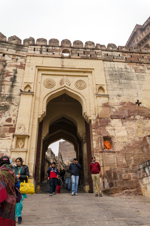 Jodhpur, India - January 1, 2015: Unidentified people walk through a gate at Mehrangarh Fort on January 1, 2015 in Jodhpur, India. City is popular tourist destination in Rajasthanのeditorial素材