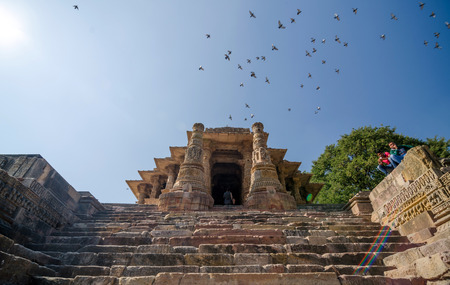 Ahmedabad, India - December 25, 2014: Indian people visit Sun Temple Modhera in Ahmedabad, India on December 25, 2014. It was built in 1026 AD by King Bhimdev of the Solanki dynasty.のeditorial素材
