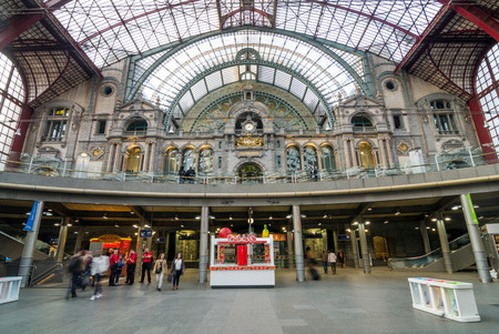 Antwerp, Belgium - May 11, 2015: People in Main hall of Antwerp Central station on May 11, 2015 in Antwerp, Belgium. The station is now widely regarded as the finest example of railway architecture in Belgium.のeditorial素材