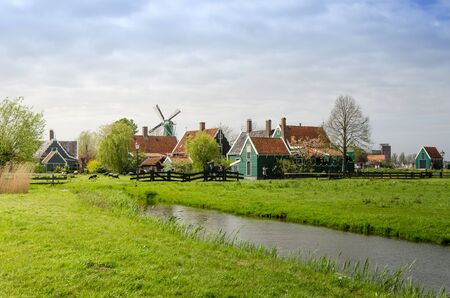 Windmill and rural houses in Zaanse Schans, The Netherlands.のeditorial素材